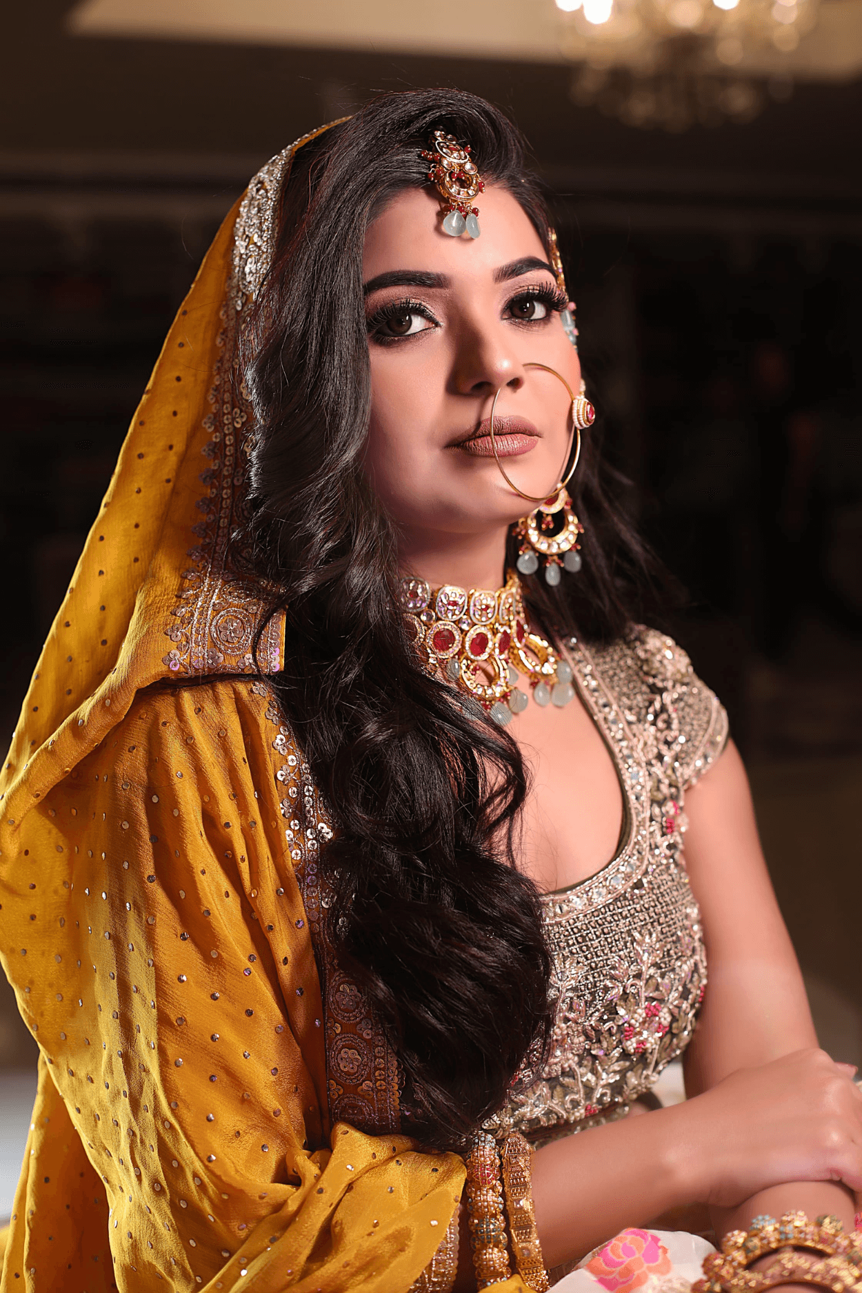 Sandhya Maurya's HD Muslim bridal makeup look, featuring an elegant and flawless finish with a traditional headpiece.