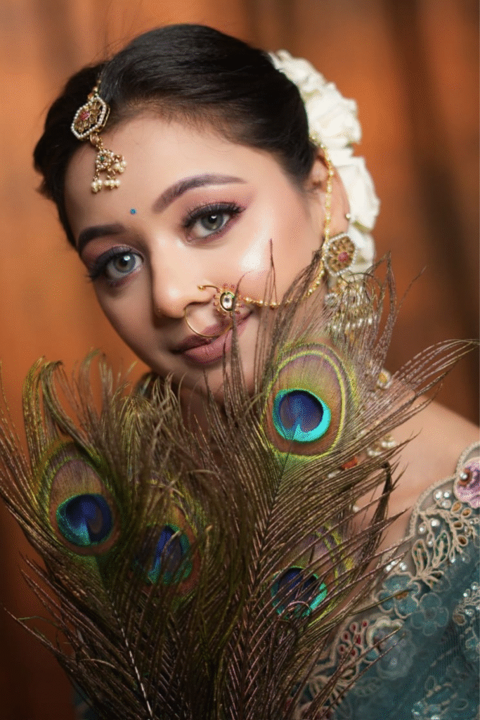 Sandhya Maurya's HD bridal makeup look, showcasing a sophisticated and elegant style with flawless skin.