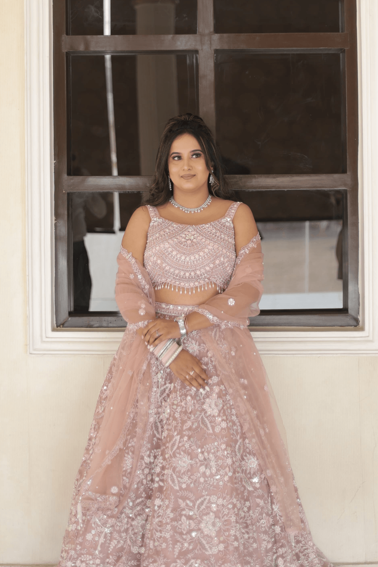 Sandhya Maurya's Ultra HD engagement makeup, showcasing a luminous, elegant style with a flawless finish.