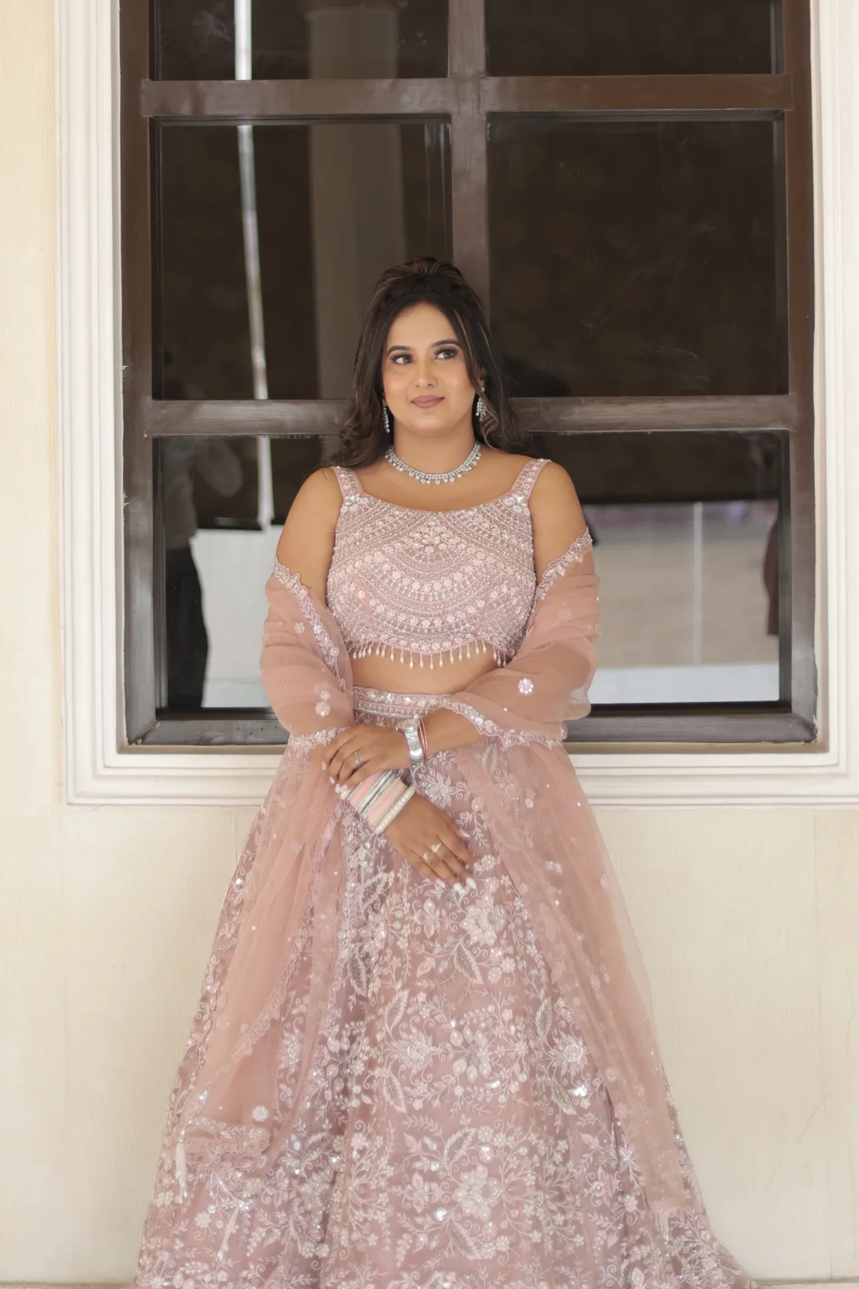 Sandhya Maurya's Ultra HD engagement makeup, showcasing a luminous, elegant style with a flawless finish.