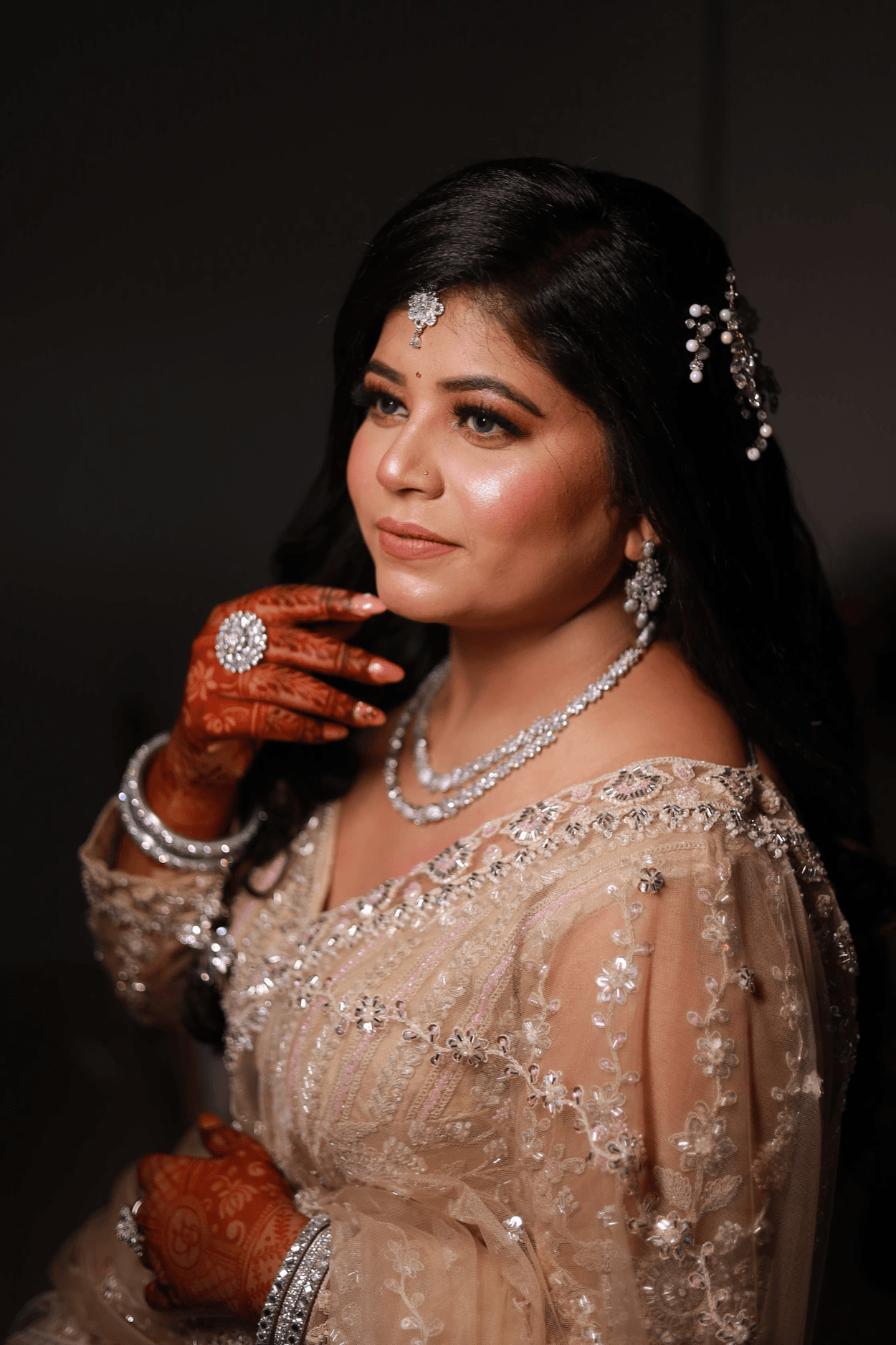 Sandhya Maurya's Ultra HD engagement makeup, showcasing a soft-glam look with a radiant, dewy finish.
