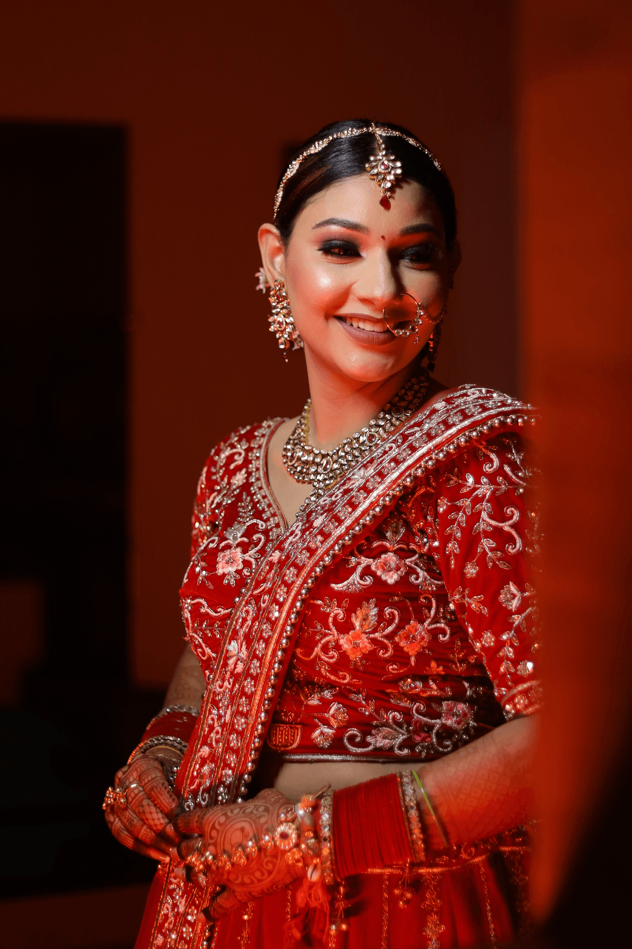 Sandhya Maurya's Ultra HD bridal makeup, showcasing a flawless complexion and a radiant, natural finish.