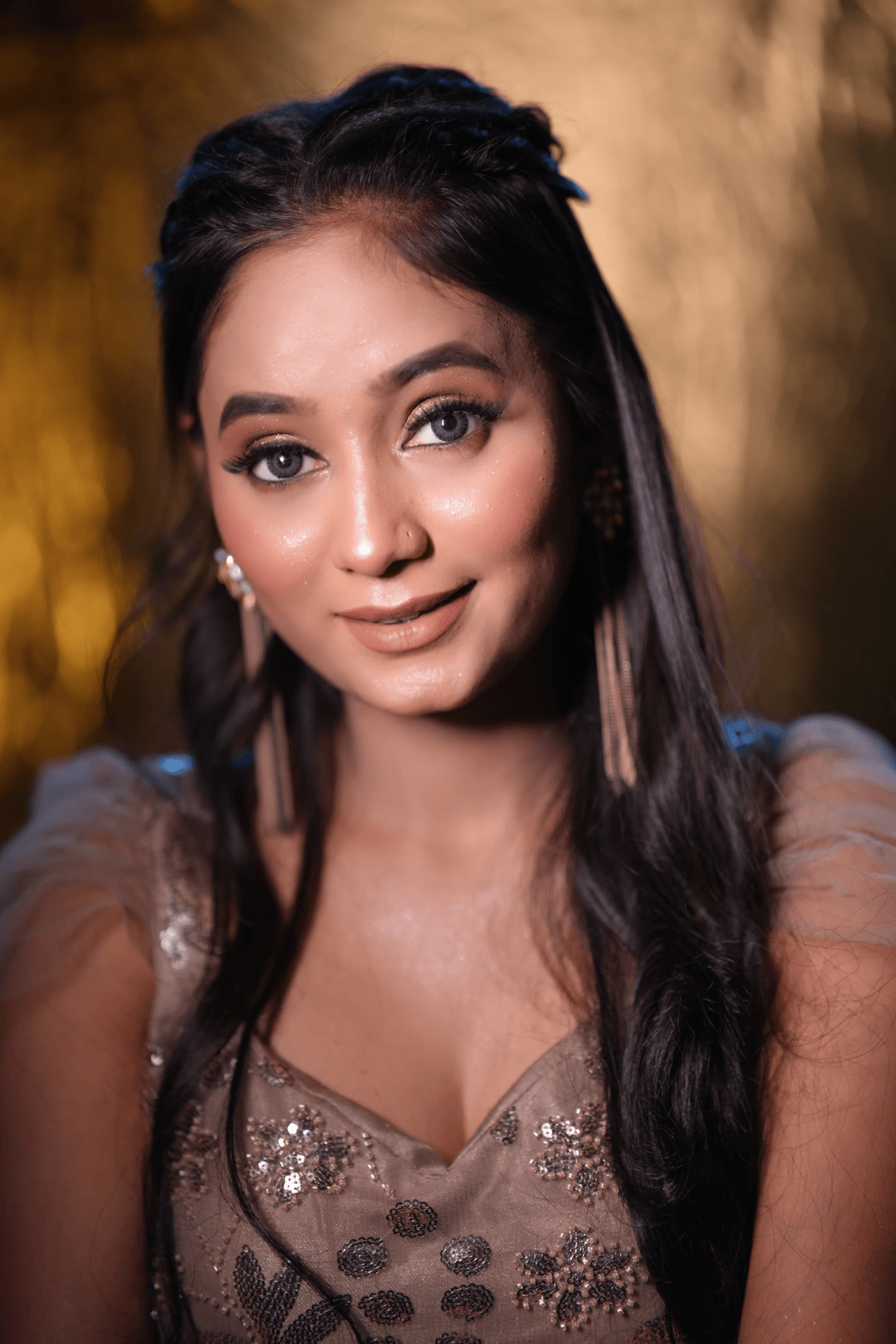 Sandhya Maurya's Ultra HD party makeup, showcasing a glamorous and flawless look perfect for an evening event.