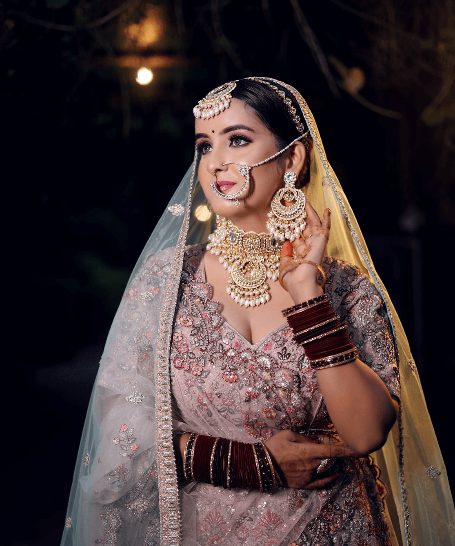Sandhya Maurya's HD bridal makeup look, showcasing a stunning, timeless look with flawless skin.