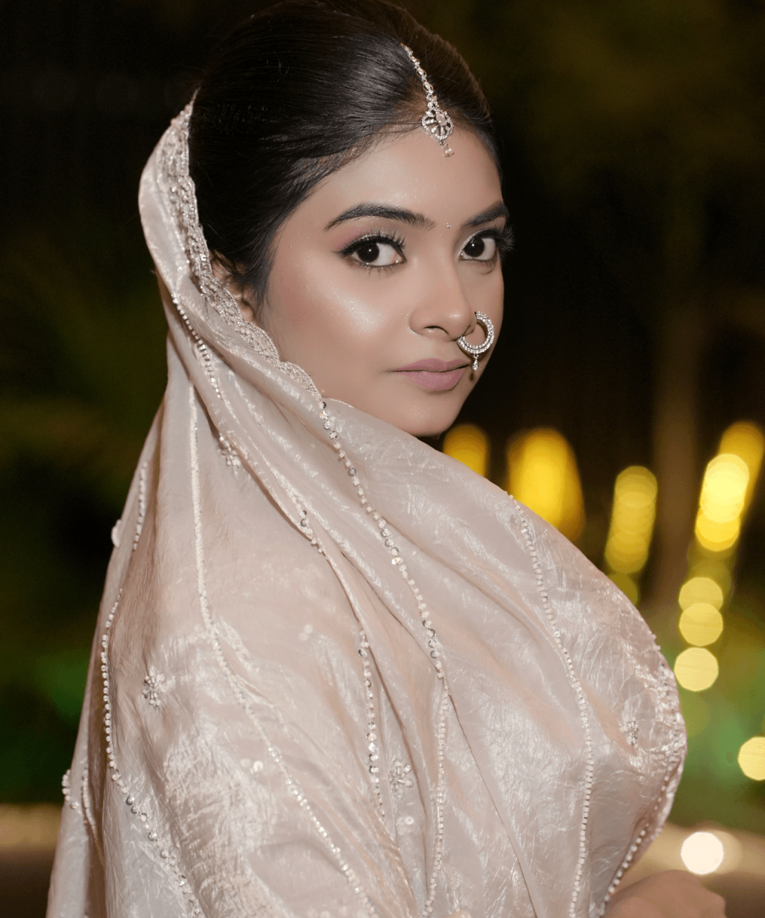 Sandhya Maurya's HD bridal makeup, showcasing a luminous and elegant bridal look with a flawless finish.