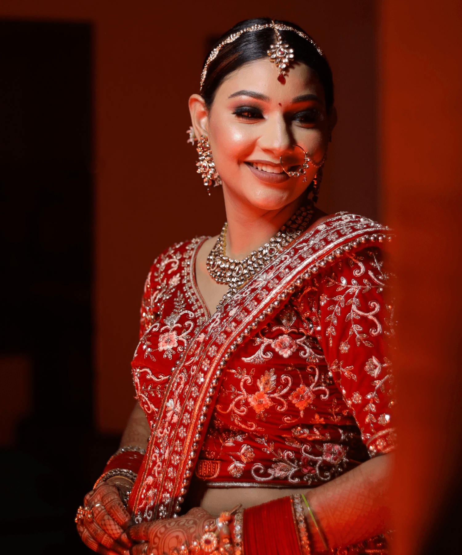 Sandhya Maurya's Ultra HD bridal makeup, showcasing a flawless complexion and a radiant, natural finish.